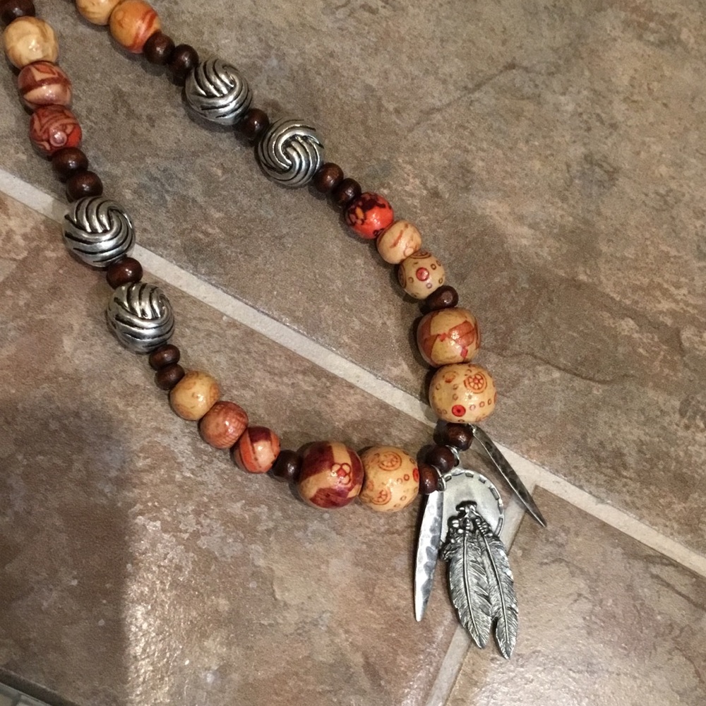 Southwest wood bead necklace with feather focal